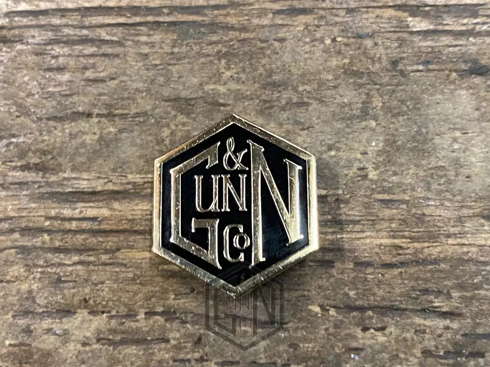 Gunn & Co Gold And Black Enamel Lapel Pin Badge. Badge